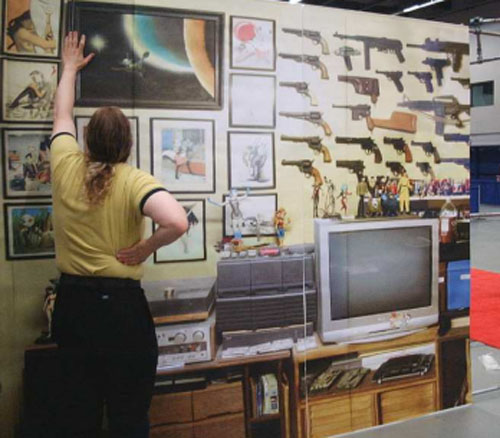 The full-scale photo replica of Taral's apartment at the 2009 Worldcon.  This is one wall of his living room.